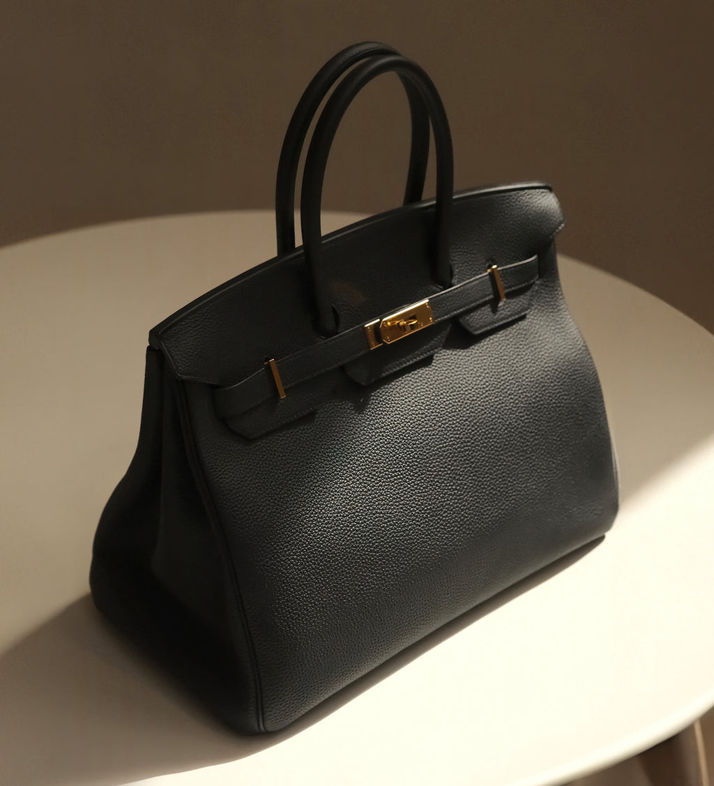 Image of black vintage Birkin Bag.